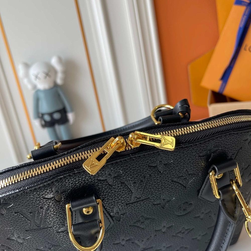 Alma Gold Monogram Leather Bucket Bag