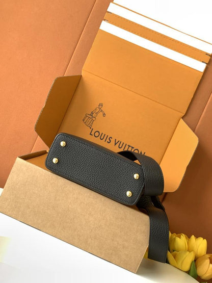 Capucines Mini in Black Taurillon Leather with Python Trim