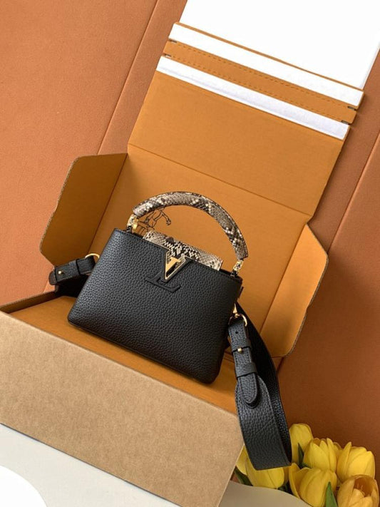 Capucines Mini in Black Taurillon Leather with Python Trim