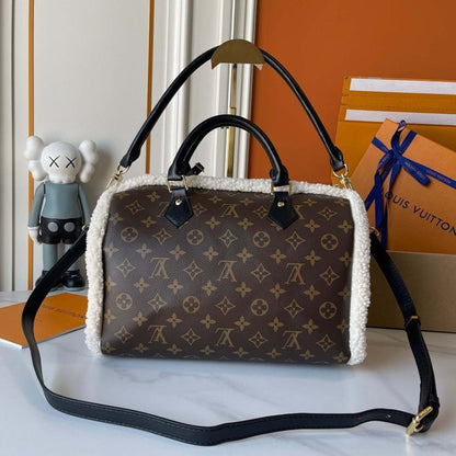 Classic Premium Monogram Lambskin Top Handle Bag