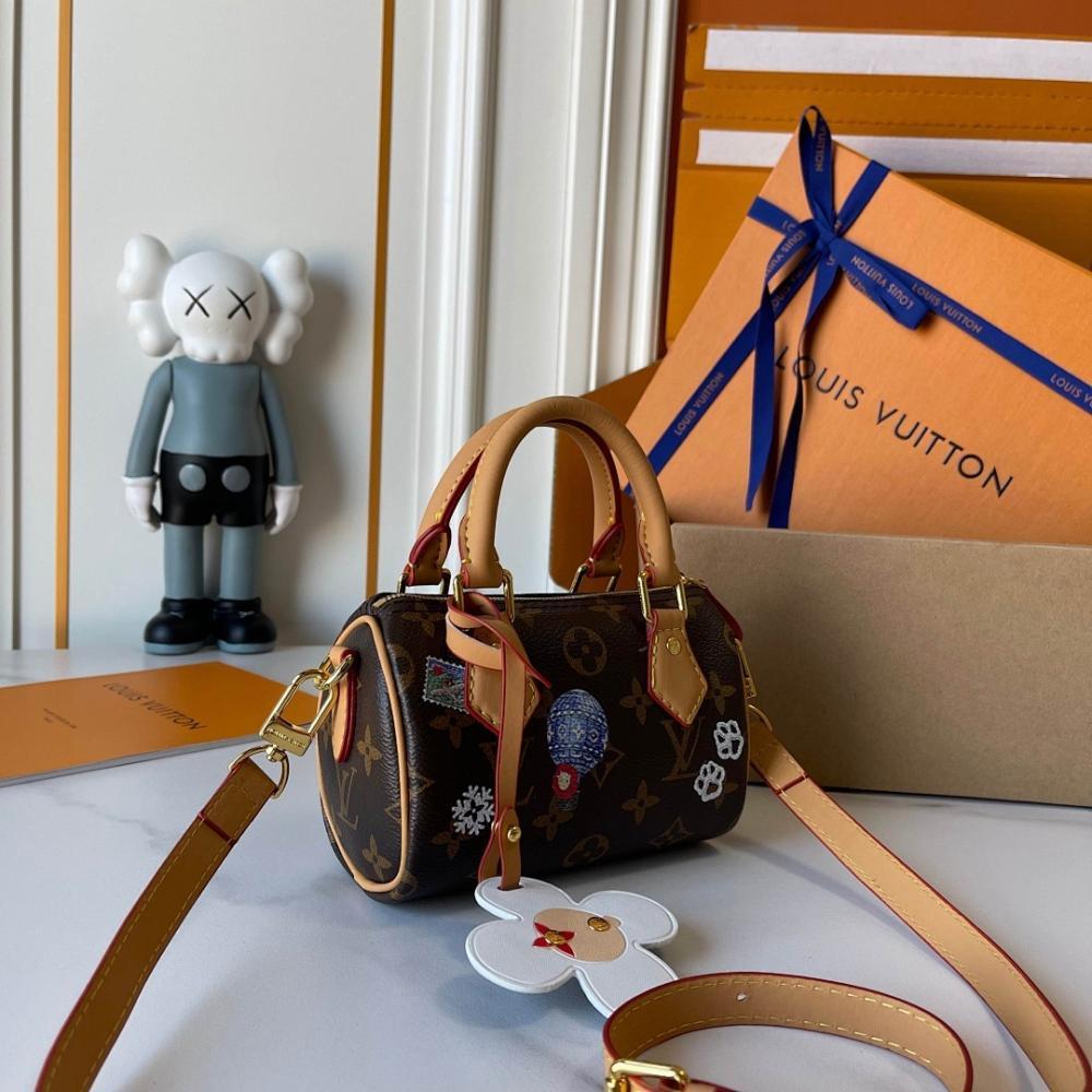 Speedy Monogram Leather Top Handle Bag