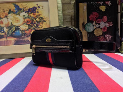 Ophidia Top Handle Bag