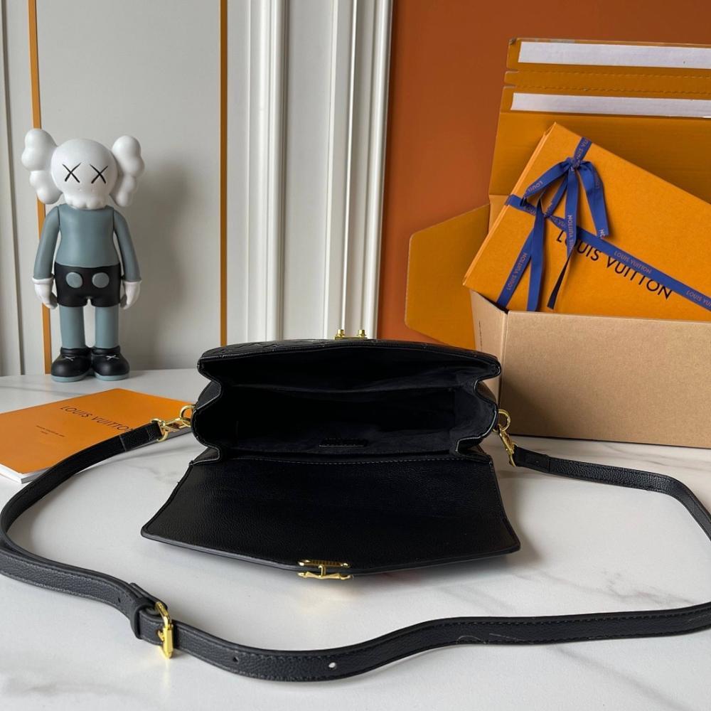 The Pouch Monogram Leather Top Handle Bag