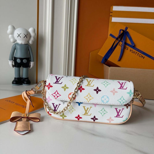 Speedy Monogram Leather Top Handle Bag