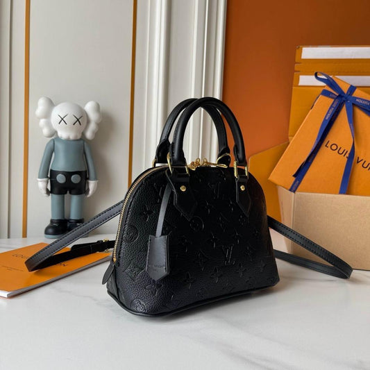 Alma Gold Monogram Leather Bucket Bag